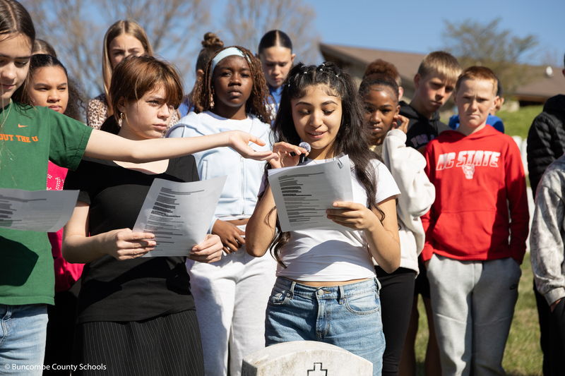 Student giving a graveside eulogy of a veteran.