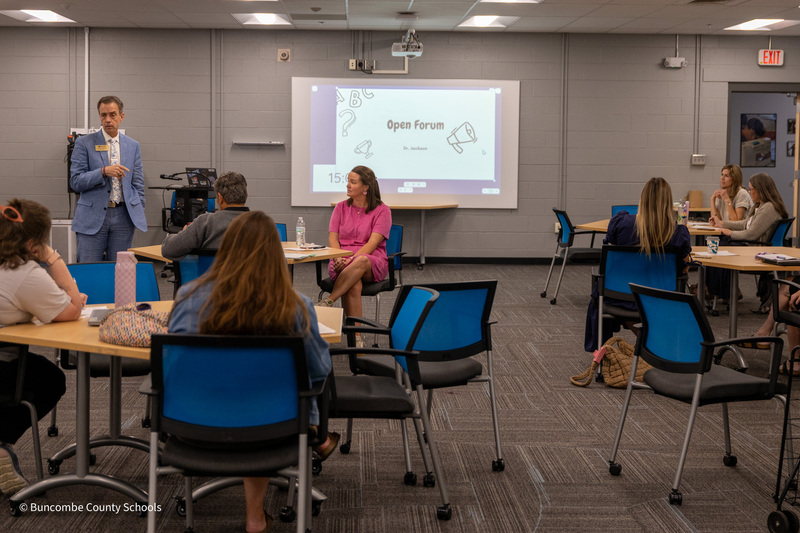 BCS Superintendent Dr. Rob Jackson addresses the  teachers seated in the meeting room.