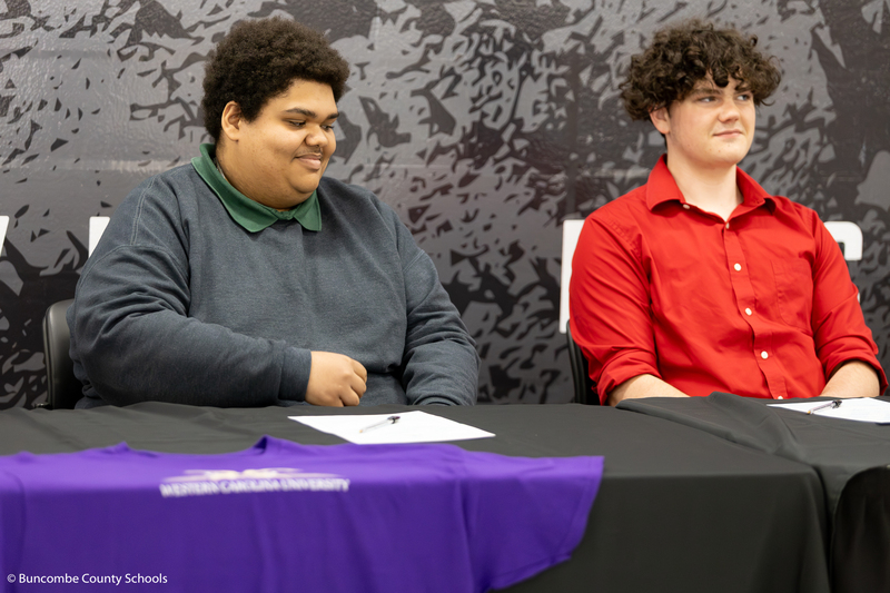 Students signing letter of intent.