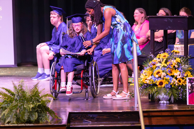 Student speaking on stage