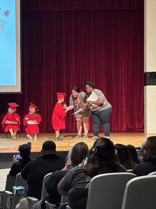 North Buncombe High Pre-K student getting a certificate. 