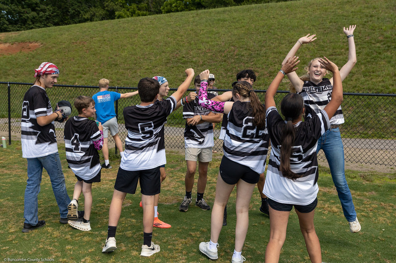 A team cheers before the start of a game.