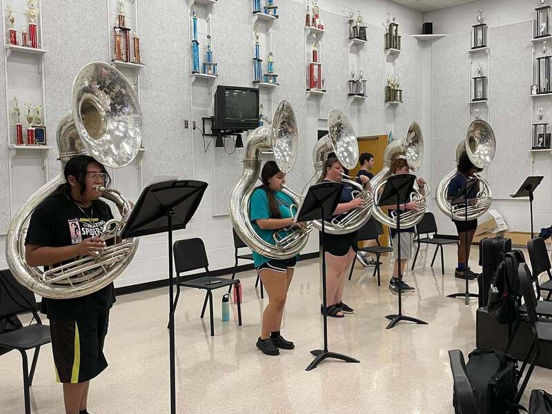 The Tuba section from the Roberson band practicing in the band room.
