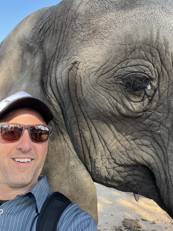 Mr. Dezio with an elephant. 
