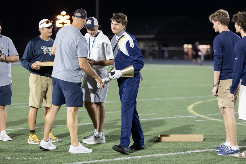 student receives championship ring
