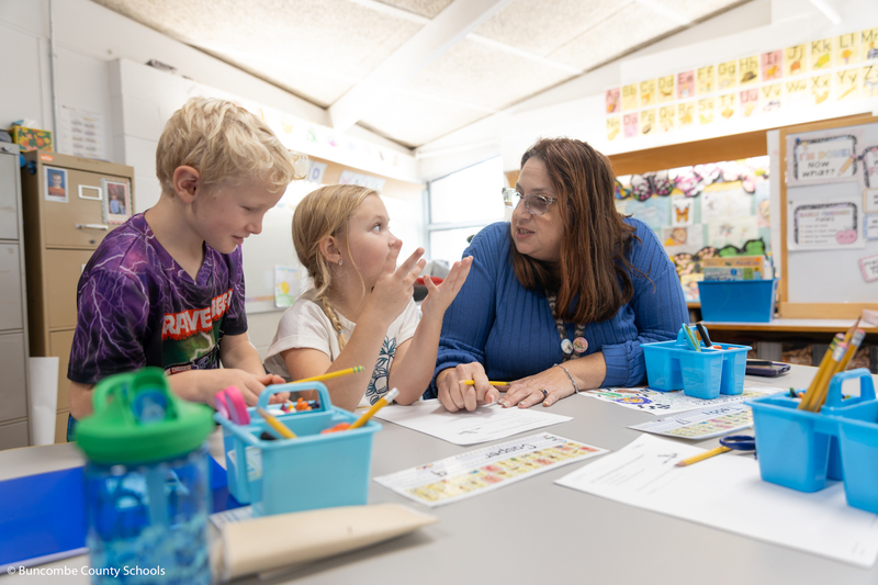 Ms. Buckner helping a student count.