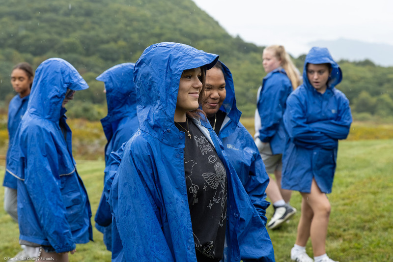 A student smiles during an outdoor game.