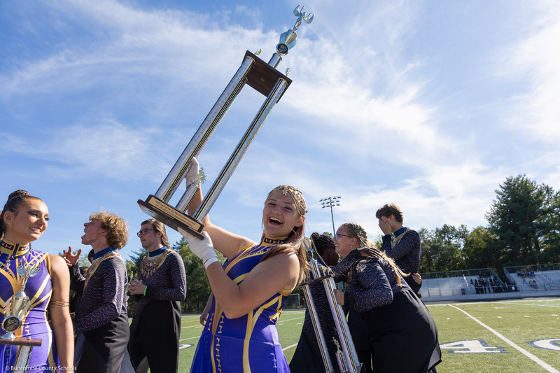 A North Buncombe High student poses with a trophy.
