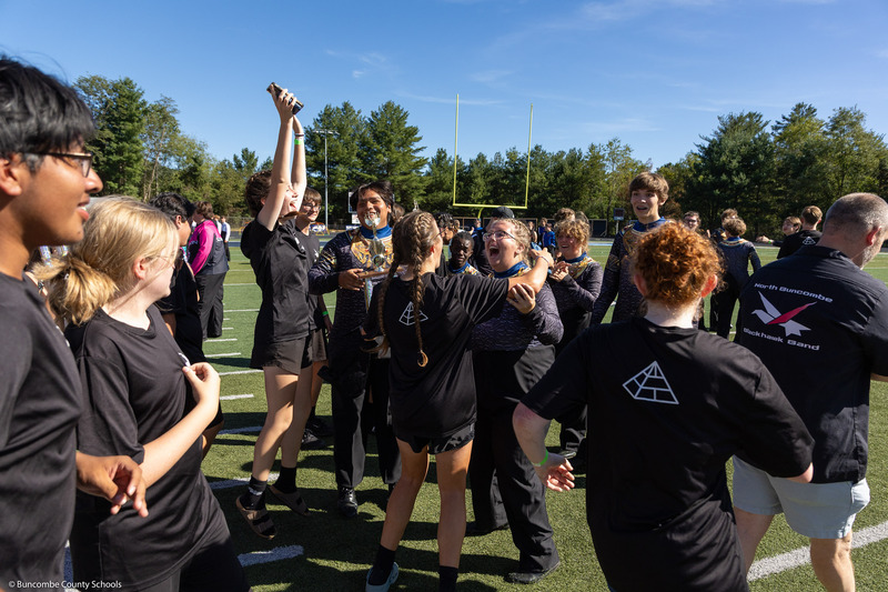 North Buncombe High marching band members celebrate.