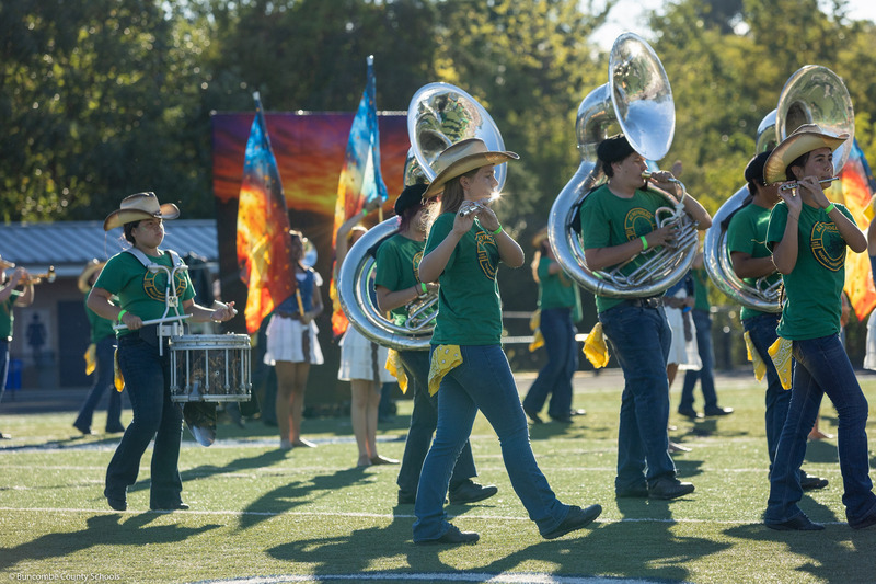 A.C. Reynolds High students march in their show.