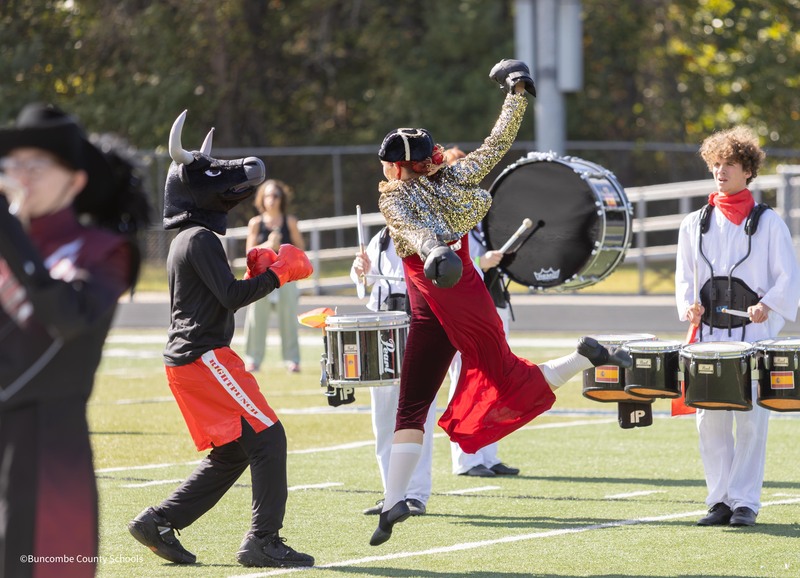 Owen High performers act out a bull-fighting scene.