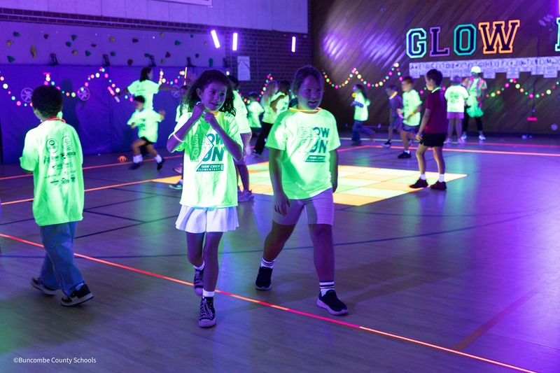 students walking at the glow run