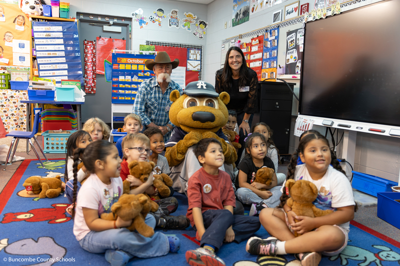 Ted E. with a group of kindergarteners, Alan and Tonia Sheppard.