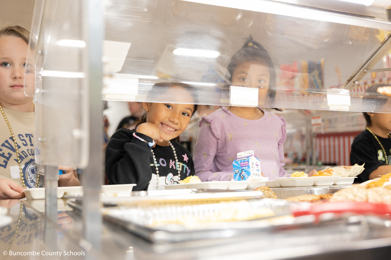 Students going through the lunch line to get food.