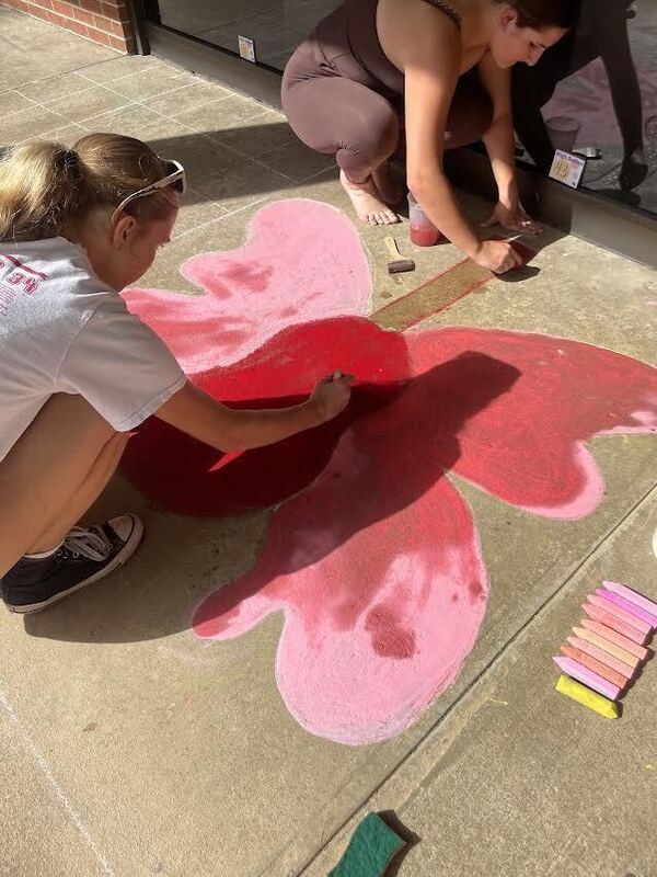 Students working on their artwork.