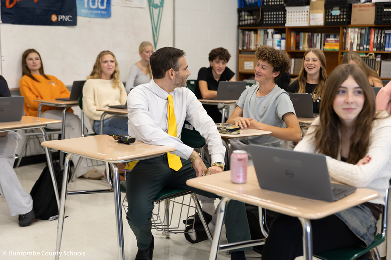 Principal Alexander talking to a student
