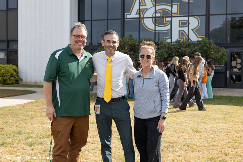 Principal Alexander with two teachers.