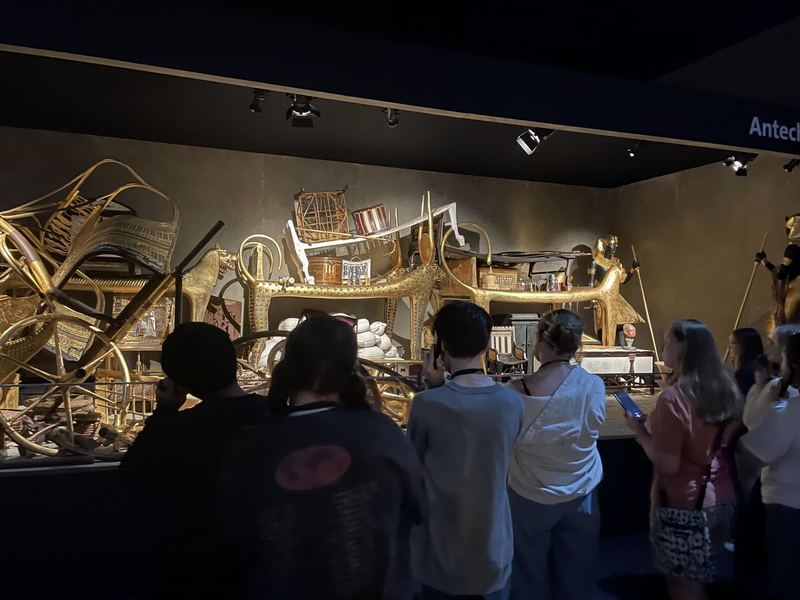 Students looking at an ancient Egypt display at the Biltmore Estate. 