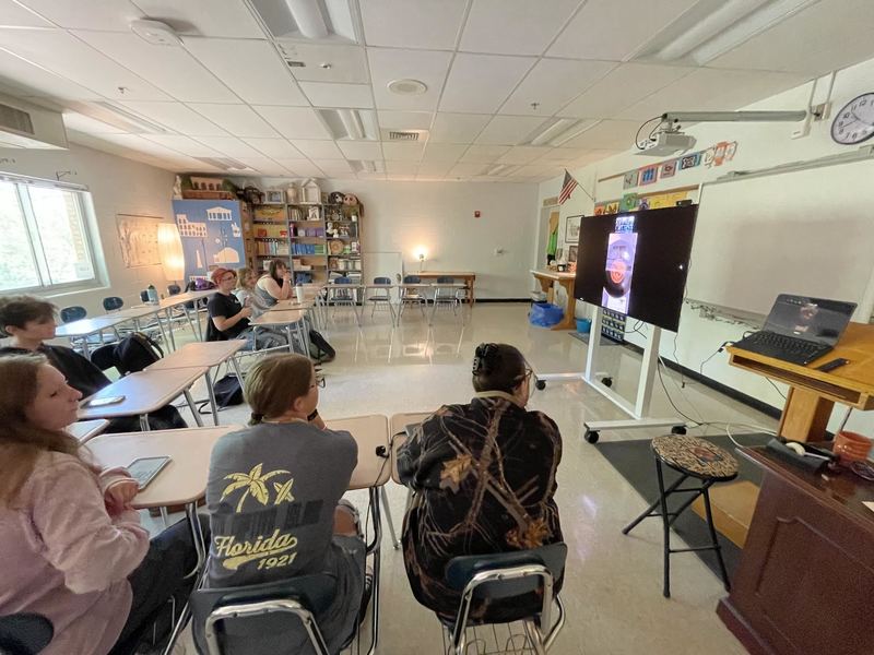 Students meeting with professionals from Greece over zoom. 