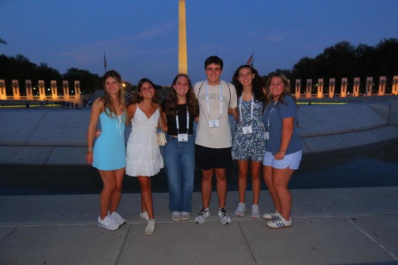 Senior Jordan Robertson with friends in front of the Washington Monument. 