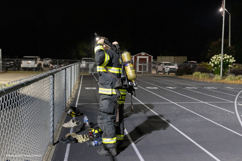 Fire fighters putting on their gear for the stairclimb