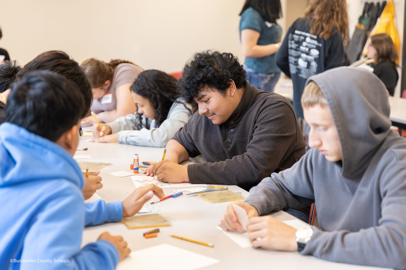 students working on their self portraits