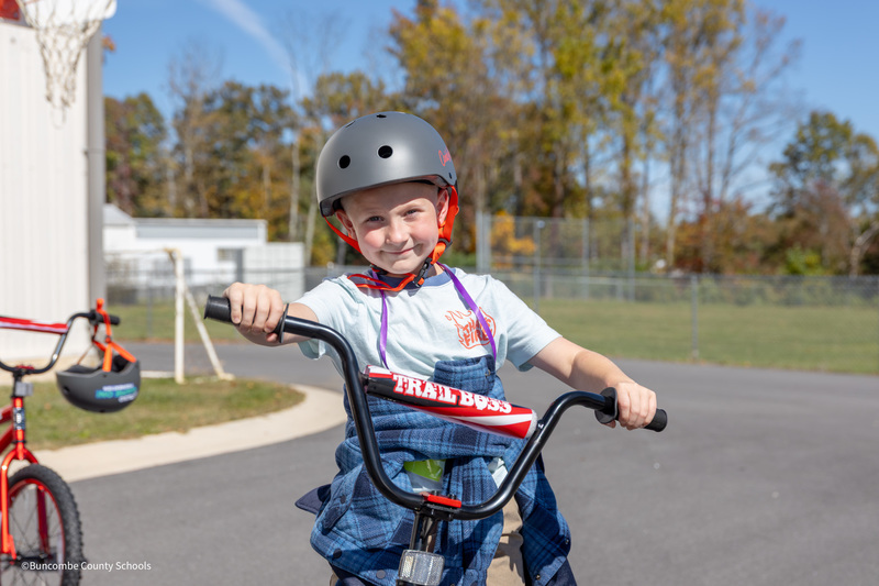 little boy on bike