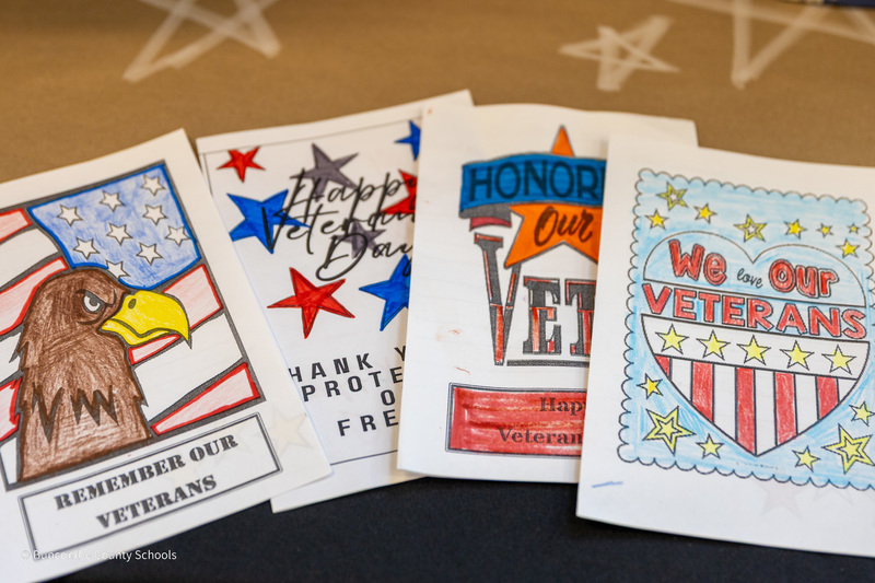 Cards for veterans displayed on a table created by Eblen Intermediate students