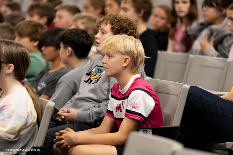 student watching the puppet show