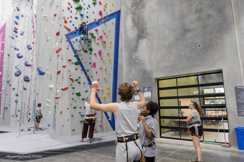 students cheering on each other