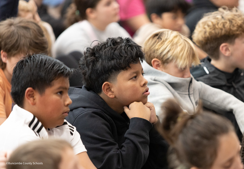 students listening to manteo