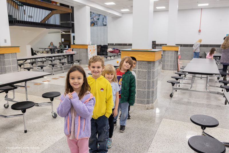 students waiting in line to bowl