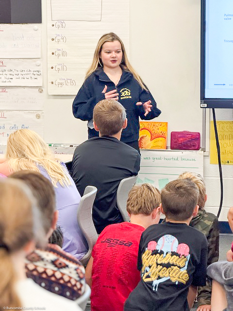 Ann Louise talks to students at Hominy Valley Elementary.