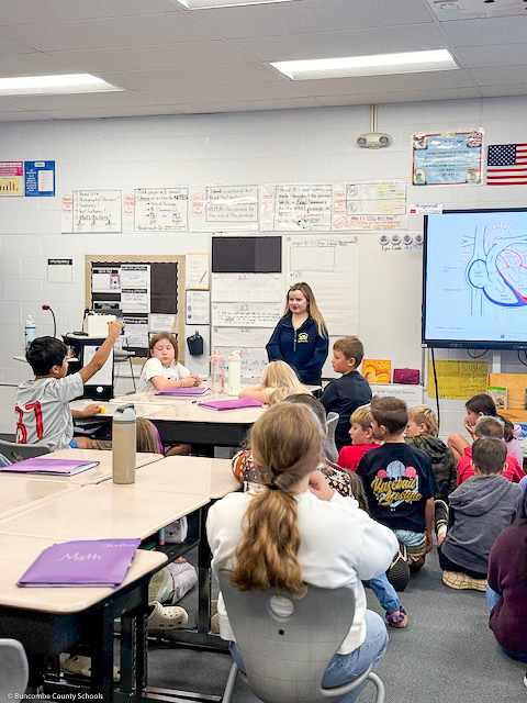 Ann Louise talks to students at Hominy Valley Elementary.