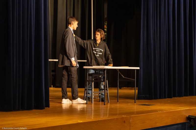 Two students perform a skit during the dress rehearsal.
