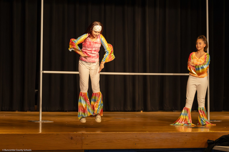 Two students perform a skit during the dress rehearsal.