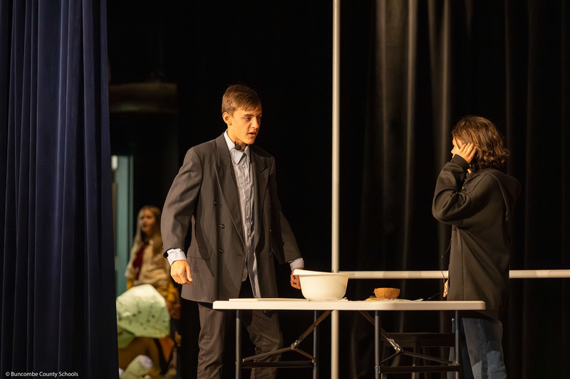 Two students perform a skit during the dress rehearsal.