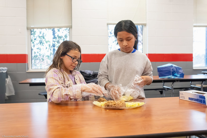 Two students make Eastern European food.