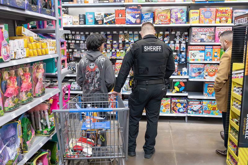 An SRO shops with a student.