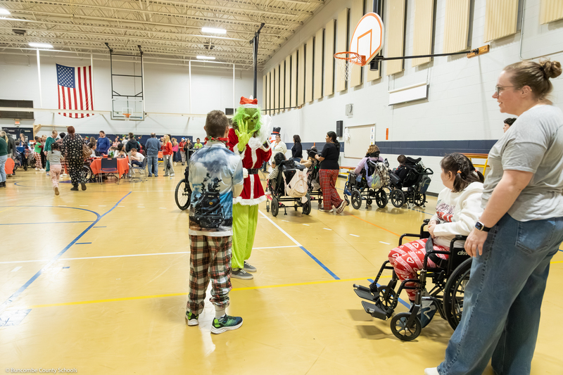 The Grinch greets PEP students.