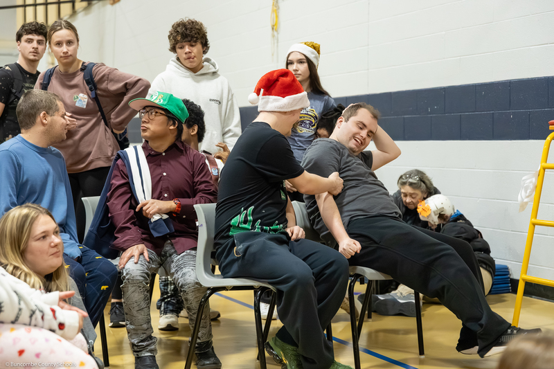 Students laugh with each other.