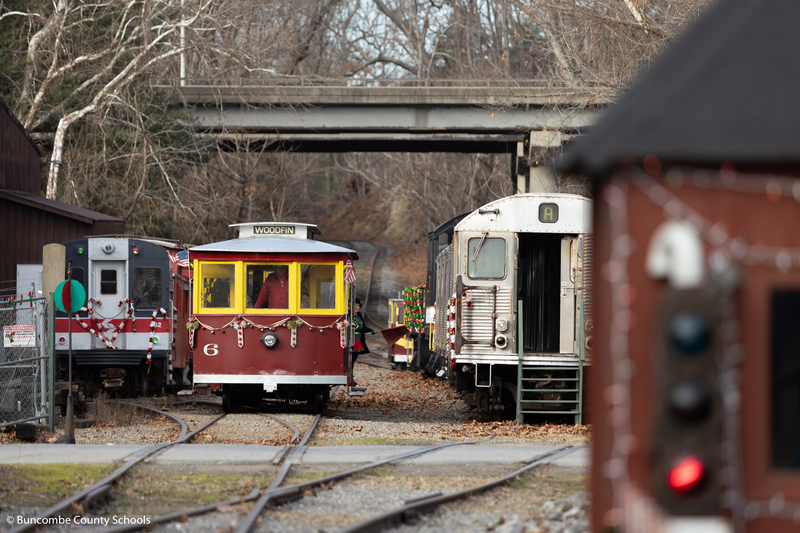 The Craggy Mountain Line Railroad train car rolling back into the station.
