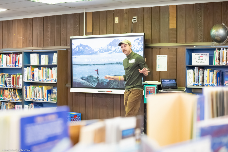 Jacob Myers speaks to students in the media center.