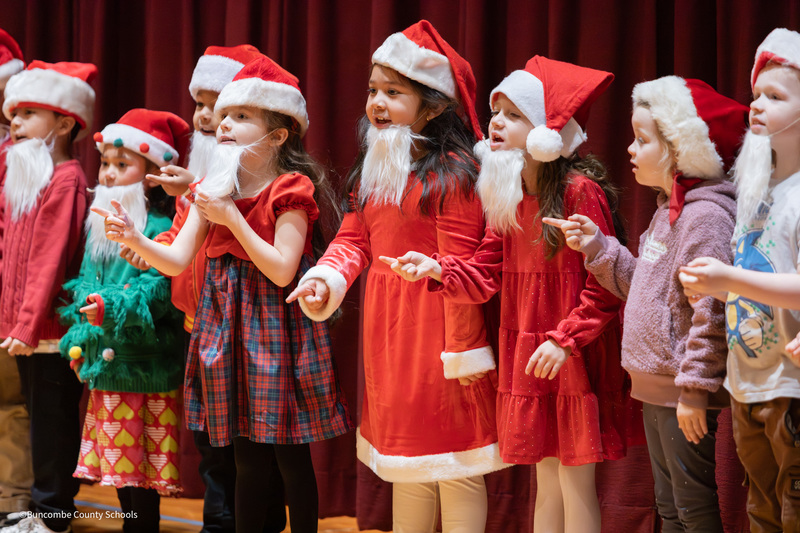 students dressed as santa