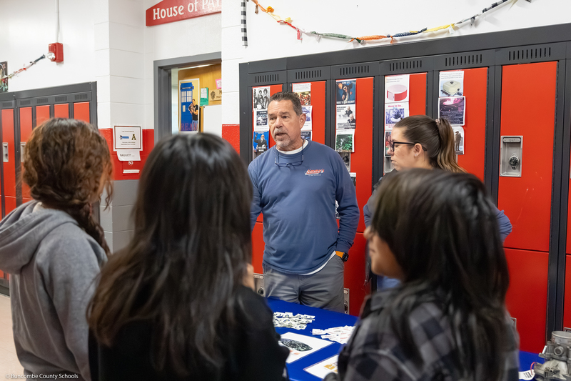 Community business representatives talk to Erwin Middle students.