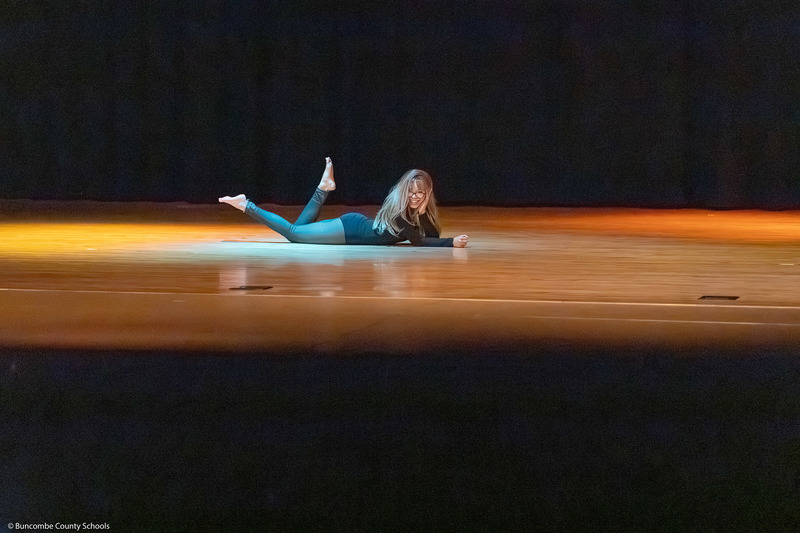 Erwin High dance students perform on stage.