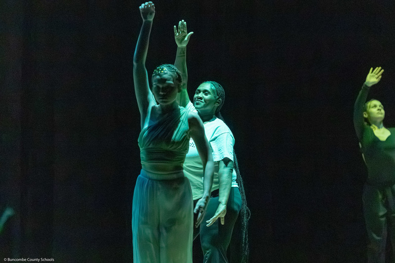 Erwin High dance students perform on stage.