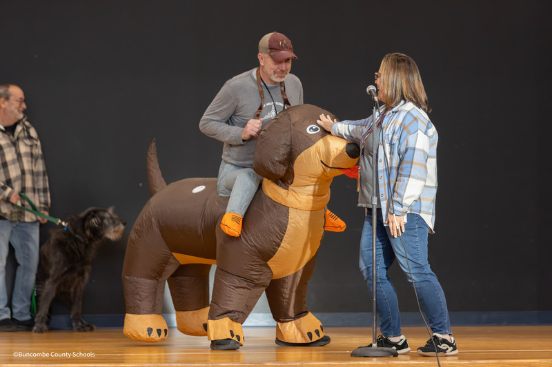 Man dressed in inflatable dog costume 