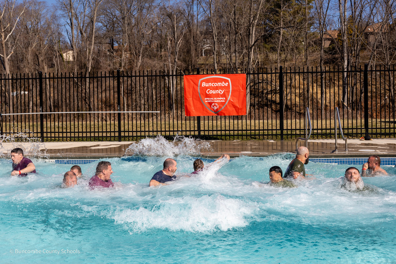 School Resource Officers in the pool after jumping.