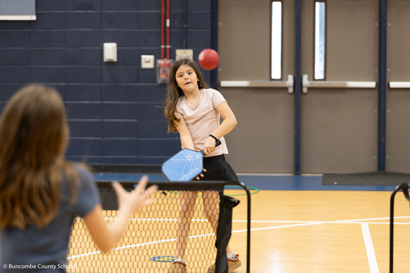 Student learning the fundamentals of Pickleball.